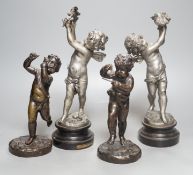A pair of bronze musical putti and a pair of seasonal spelter putti - tallest 32cm