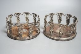 A pair of 19th century Anglo-Indian silver plated figural wine coasters.