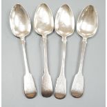 Two pairs of William IV silver fiddle pattern table spoons, London, 1831 and 1833, 9oz.