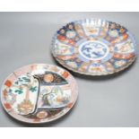 Two Japanese Imari wall plates - largest 35cm diameter