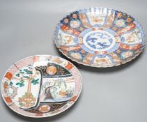 Two Japanese Imari wall plates - largest 35cm diameter