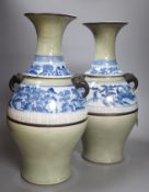A pair of Chinese celadon ground underglaze blue vases, early 20th century-44cm high.