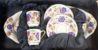 3 cased Güral porcelain sets