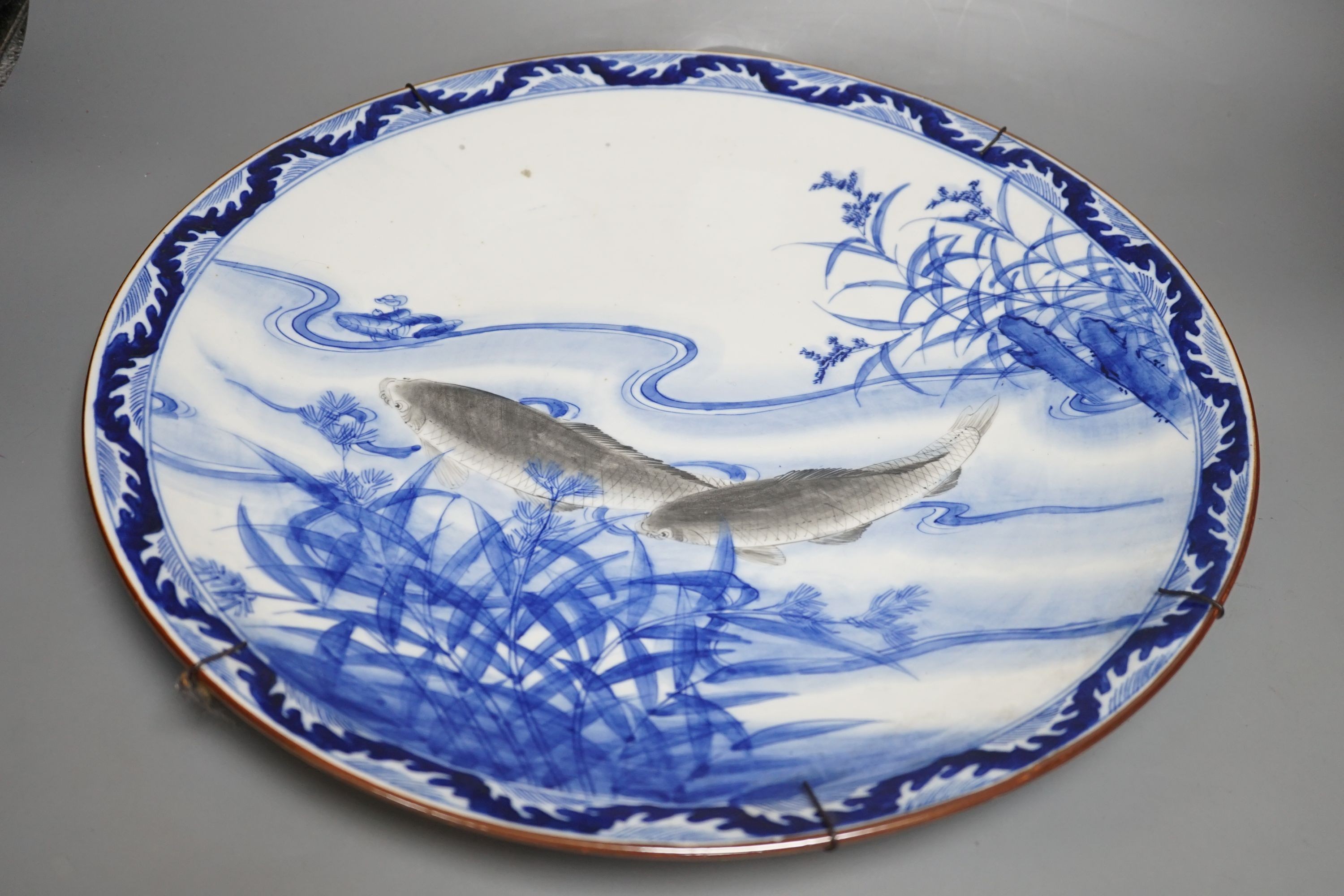 A Japanese porcelain ‘fish’ charger, 46cm - Image 2 of 3