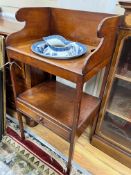 A Regency mahogany two tier washstand, together with a Staffordshire blue and white jug and basin,