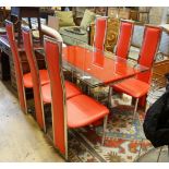 A set of red Italian design dining chairs and an associated chrome table, width unextended 120cm