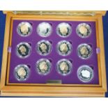 A cased Royal Mint QEII Golden Jubilee collection of twenty four Commonwealth silver proof coins