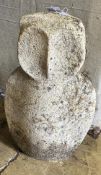 A reconstituted stone owl garden ornament, height 49cm