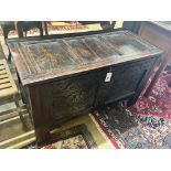 An 17th / 18th century oak coffer, with carved twin panelled front, width 103cm depth 50cm height