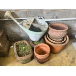 A pair of rectangular terracotta garden planters, width 40cm, a vintage watering can and six
