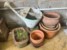A pair of rectangular terracotta garden planters, width 40cm, a vintage watering can and six