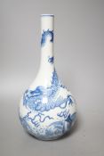 A Chinese blue and white ‘dragon’ bottle vase, 25cm