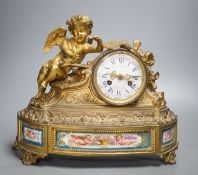 A French ormolu and Sevres style porcelain mounted putti mantel clock by Le Roy et Fils, Palais