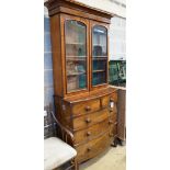 A Victorian and later mahogany bookcase on bowfront chest, width 93cm depth 46cm height 216cm