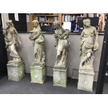 A set of four reconstituted stone garden figures, representing the Four Seasons, tallest 170cm