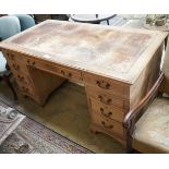 An early 20th century faded oak pedestal desk, length 153cm, depth 80cm, height 77cm