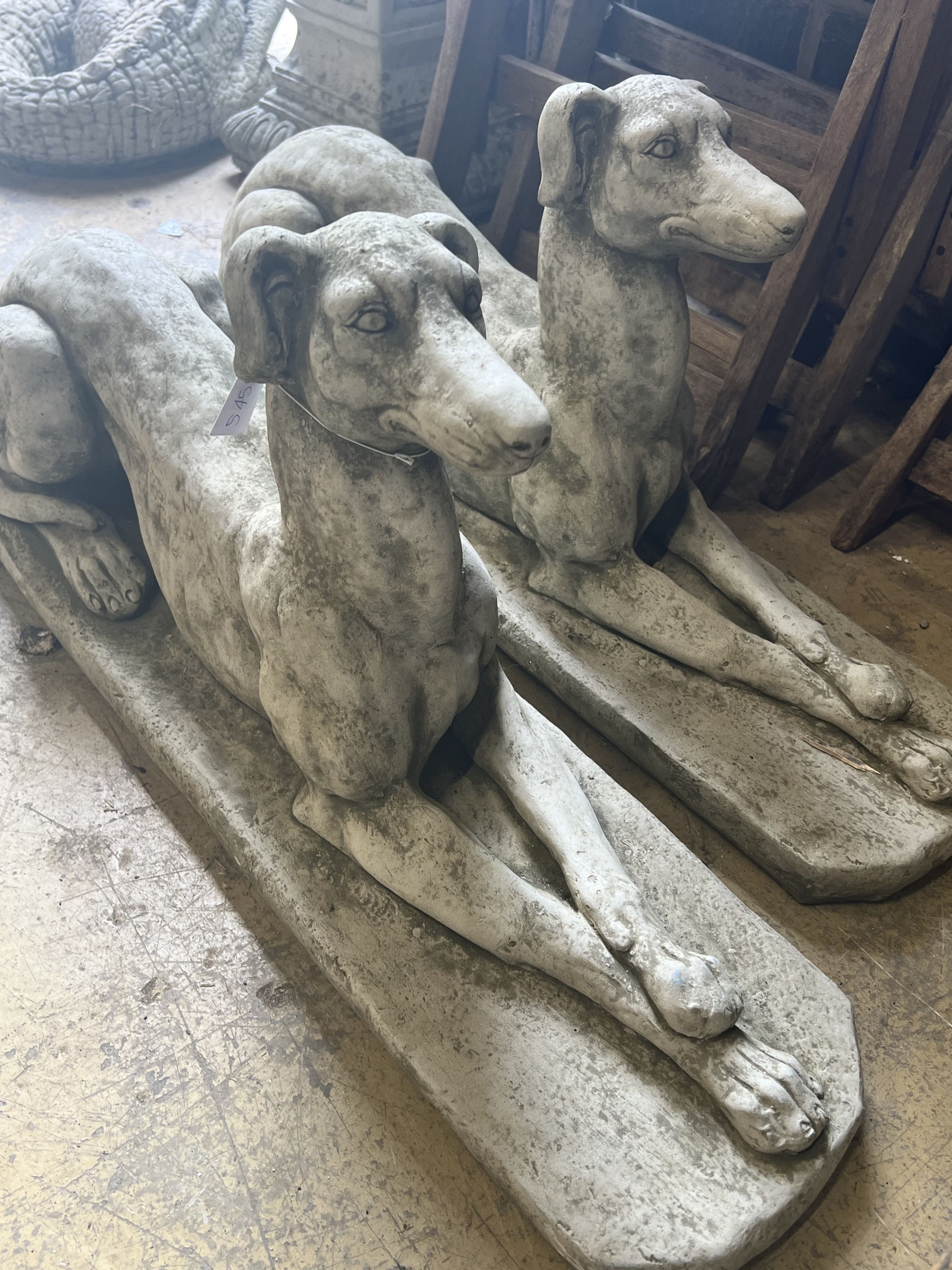 A pair of reconstituted stone recumbent greyhound ornaments, length 82cm - Image 6 of 6