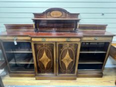 An Edwardian marquetry inlaid mahogany breakfront side cabinet, width 227cm depth 39cm height 155cm