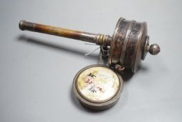 A 19th century Tibetan white metal mounted copper prayer wheel with interior script and a Persian