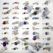 A collection of forty five assorted 9ct gold and gem set rings, including opal, emerald and