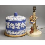 A Victorian blue jasper cheese bell cover, later wood stand, 23 cm high, and a Hummel table lamp