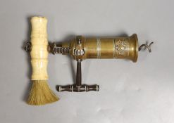 A 19th century Thomason type patent corkscrew with bone handle, 18 cms high.