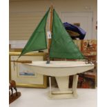 A pond yacht with stand,100cms wide x 100cms high.