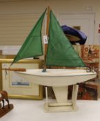 A pond yacht with stand,100cms wide x 100cms high.