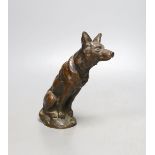 E, Ilinsky, a brown patinated bronze seated dog car mascot signed, worth foundry mark Fumiere et