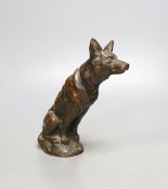 E, Ilinsky, a brown patinated bronze seated dog car mascot signed, worth foundry mark Fumiere et