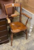 A Victorian ash, elm and beech Windsor elbow chair