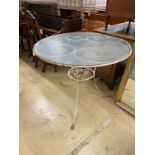 A circular painted wrought iron glass top garden table, diameter 92cm, height 76cm.