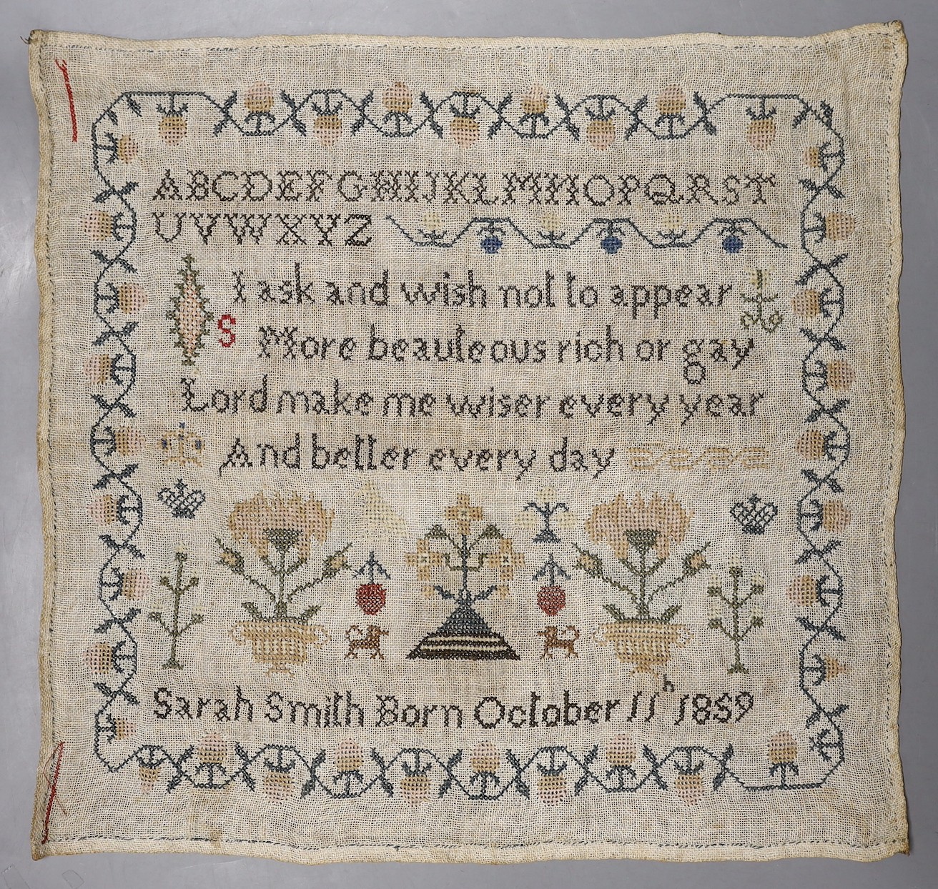 A 19th century cross stitch sampler by Sarah Smith, dated 1859 - 40 x 40cm