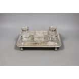 A George III silver rectangular inkstand, with three mounted cut glass wells, Matthew Bolton,