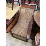 A caned hardwood plantation chair, width 66cm, depth 100cm, height 90cm