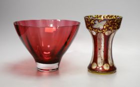 An American? enamelled glass vase and a ruby glass bowl,bowl 23.5 cms diameter.