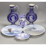 A pair of Royal Copenhagen plates, a pair of German pottery ewers a blue and white dish and pickle