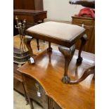 A George III style beech dressing stool on ball and claw feet, width 55cm, height 47cm.