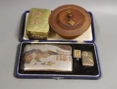 A Japanese sterling cigarette case, vesta, a locket, box and carved circular bowl and cover, bowl