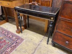 A late 19th century French gilt metal mounted ebonised rectangular folding card table, width 90cm,