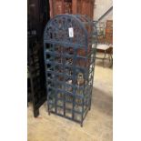 A painted wrought iron 32 bottle wine locker with padlock, width 43cm, height 112cm