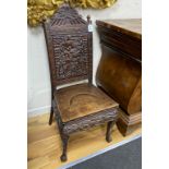 A Chinese carved hardwood side chair