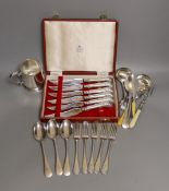A cased set Garrard pistol handled steak knives, other plated cutlery and a plated mug