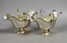 A pair of late Victorian Scottish silver double lipped sauceboats, Hamilton & Inches, Edinburgh,