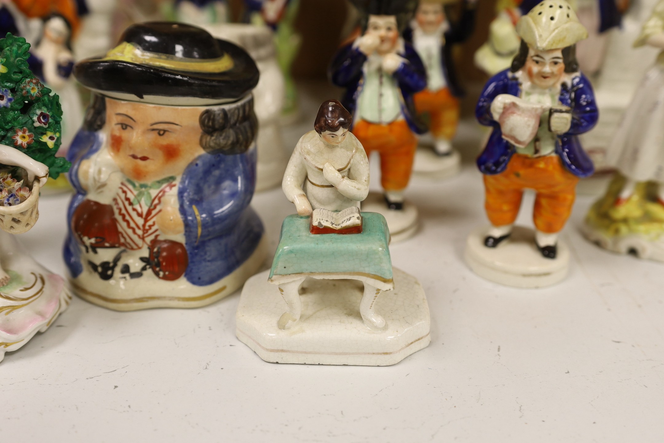 A large group of Staffordshire pottery figures and groups and figural cruets, to include a Nelson - Image 2 of 5