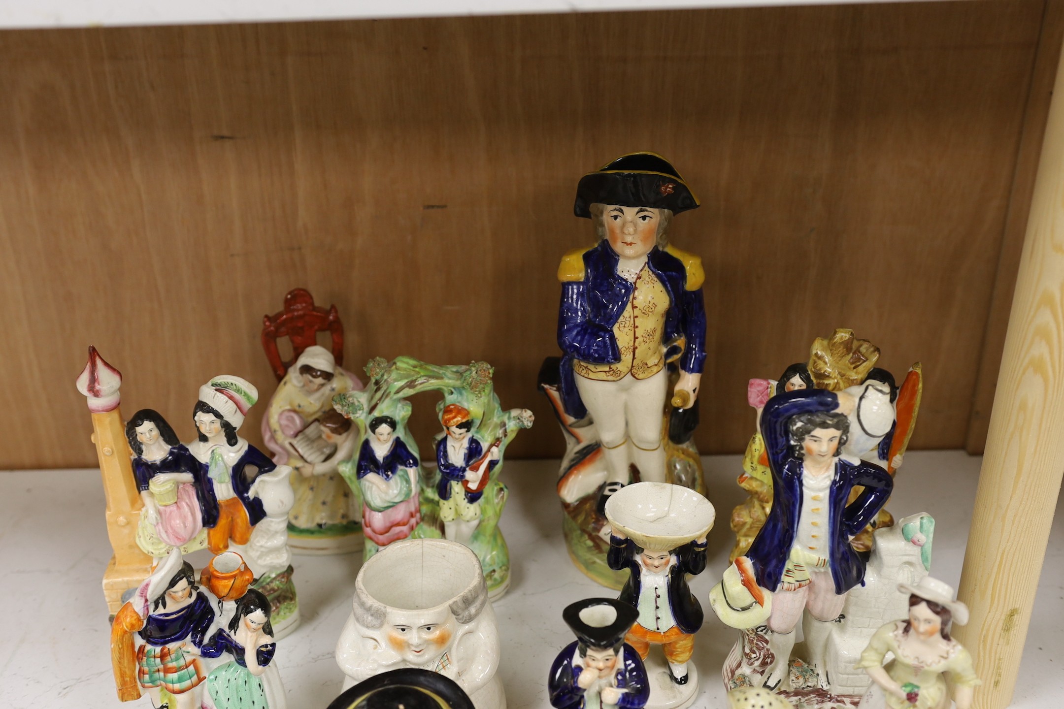 A large group of Staffordshire pottery figures and groups and figural cruets, to include a Nelson - Image 5 of 5