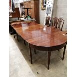 A George III mahogany D end extending dining table 304cm extended, two spare leaves, depth 122cm,