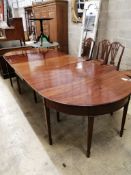 A George III mahogany D end extending dining table 304cm extended, two spare leaves, depth 122cm,