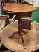 A Victorian mahogany oval tilt top tripod wine table, width 54cm, depth 30cm, height 69cm