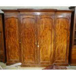 A Victorian mahogany breakfront compactum wardrobe, width 248cm, depth 69cm, height 210cm